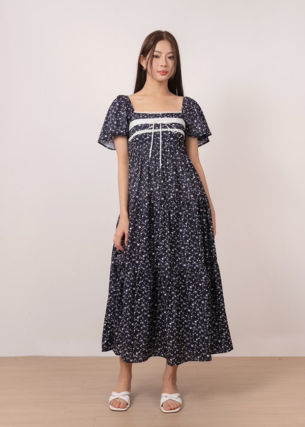 Sugarplum Flutter Sleeve Maxi Dress in Navy x White Floral Prints