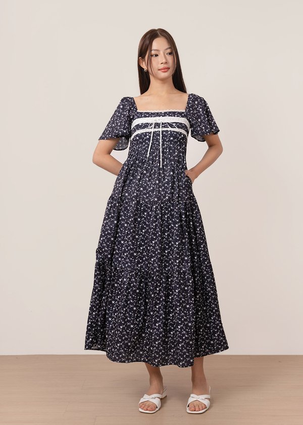 Sugarplum Flutter Sleeve Maxi Dress in Navy x White Floral Prints